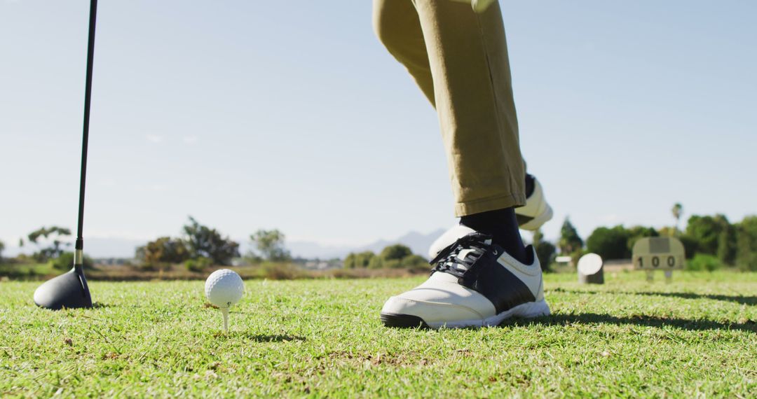 Image of legs of caucasian man playing golf on golf field - Free Images, Stock Photos and Pictures on Pikwizard.com