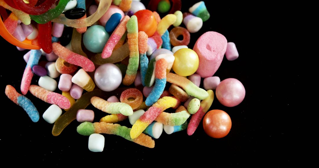 Colorful Assorted Candies Isolated on Black Background - Free Images, Stock Photos and Pictures on Pikwizard.com