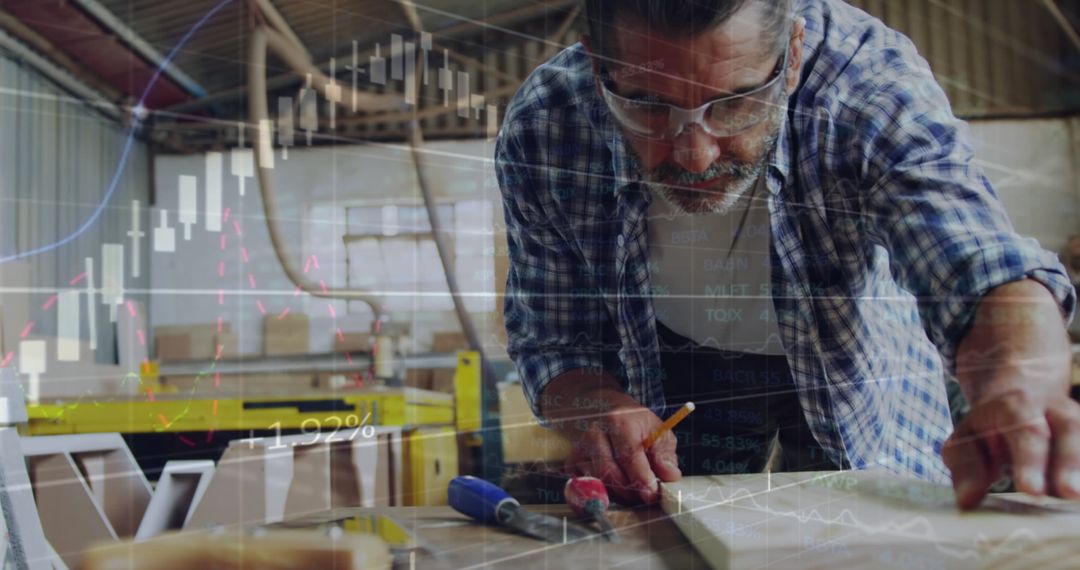 Man Analyzing Statistics in Workshop