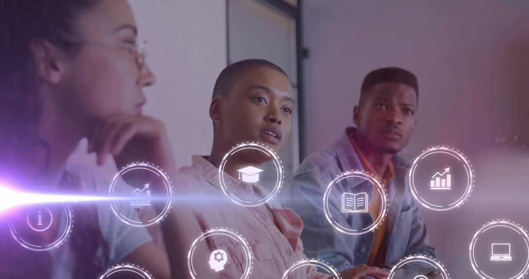 Digital Interface Icons Over Young Diverse Professionals in Office Meeting