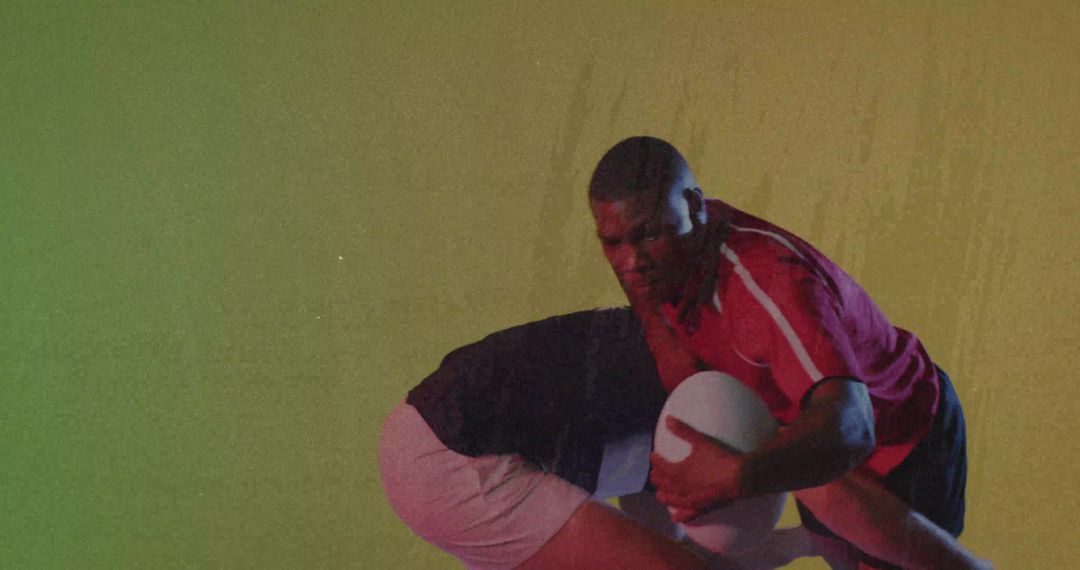 Intense Rugby Tackle Action against Studio Backdrop
