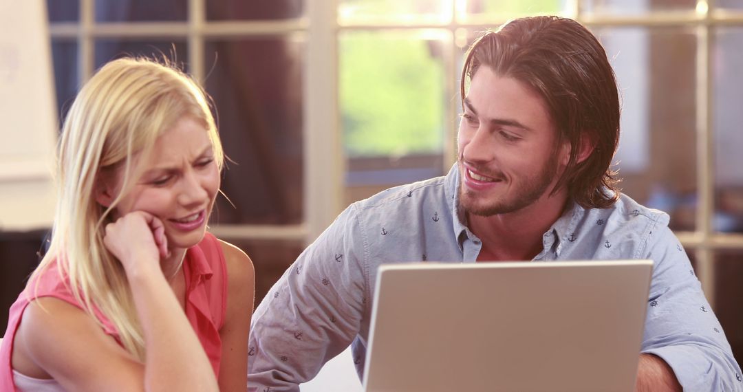 Guy Helping Girl with Computer in Bright Room - Free Images, Stock Photos and Pictures on Pikwizard.com