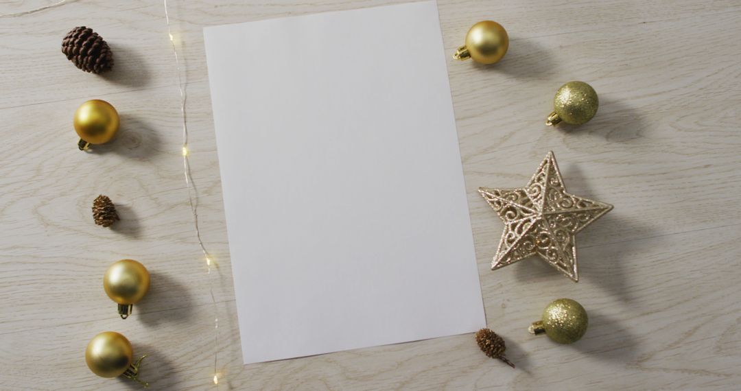 Image of christmas decorations with white card and copy space on wooden background - Free Images, Stock Photos and Pictures on Pikwizard.com
