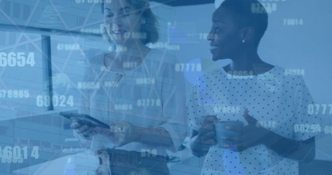 Diverse Businesswomen Engaging in Tech Data Environment