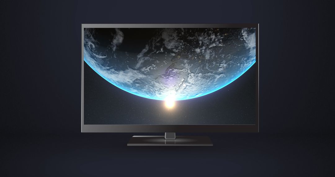 Modern TV Displaying Globe with Sunrise Over Black Background