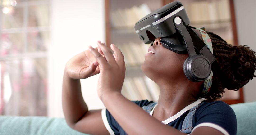 Child VR Gaming Indoors with Headset - Free Images, Stock Photos and Pictures on Pikwizard.com