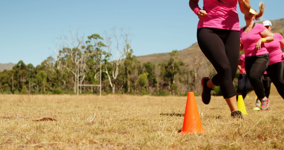 Women Running on Open Field in Empowering Outdoor Exercise Session - Free Images, Stock Photos and Pictures on Pikwizard.com