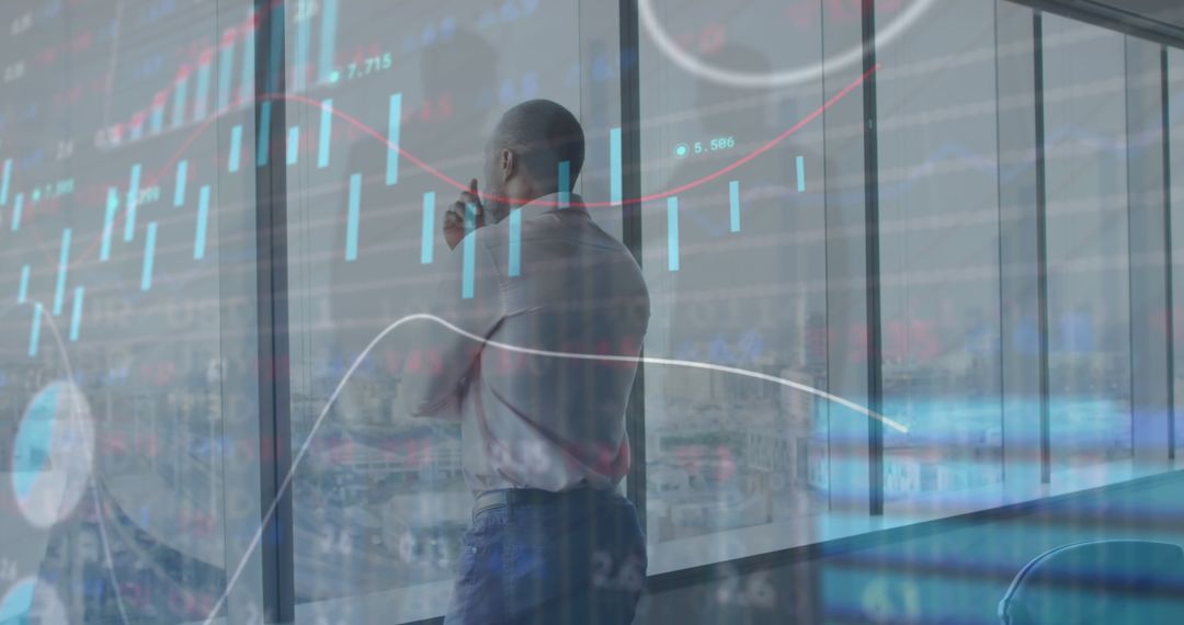 Thoughtful Man Analyzing Stock Market Trends with Data Overlay