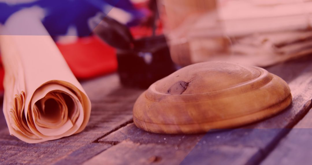 Close-Up of Wooden Sound Block and Rolled Documents in Courtroom