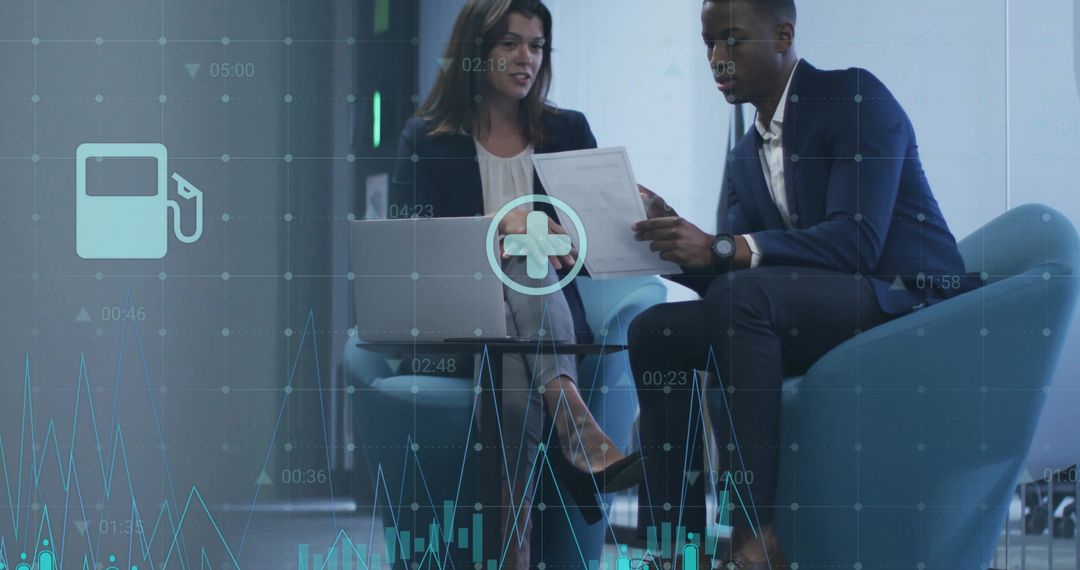 Colleagues Analyzing Data with High-Tech Overlay in Modern Office Lounge