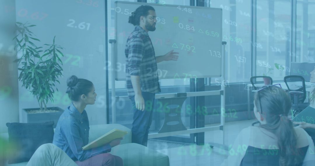 Team Brainstorming with Digital Financial Overlay in Modern Office