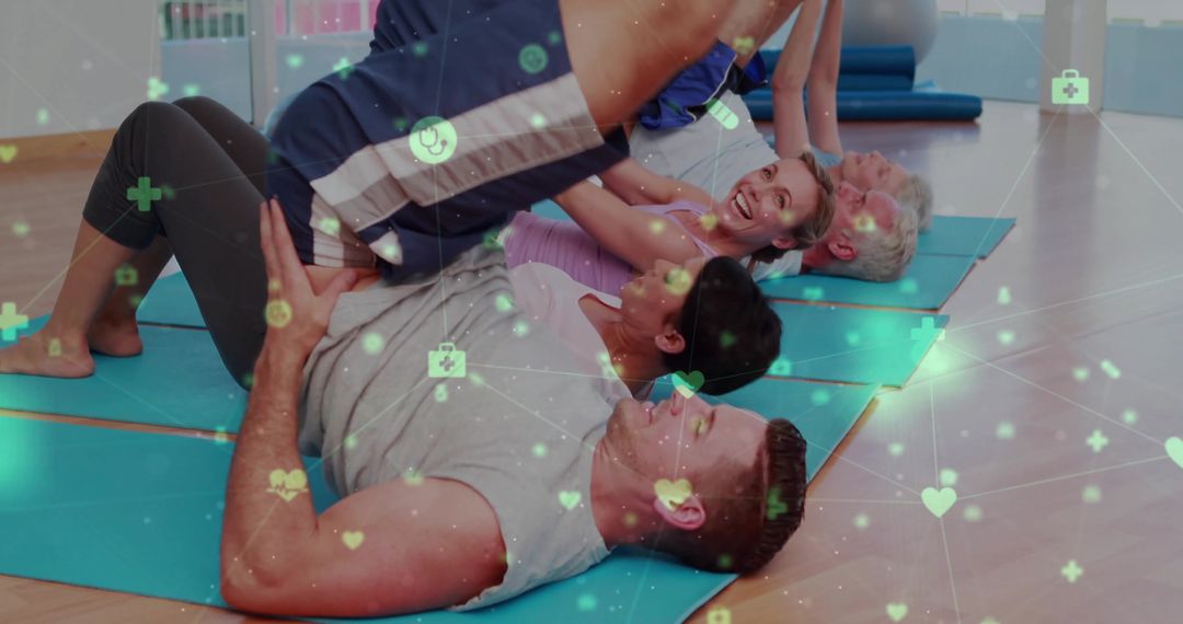 Yoga Group Engaged in Partner Stretch at Studio Class