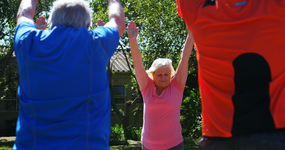 Active Seniors Engaging in Group Outdoor Exercise