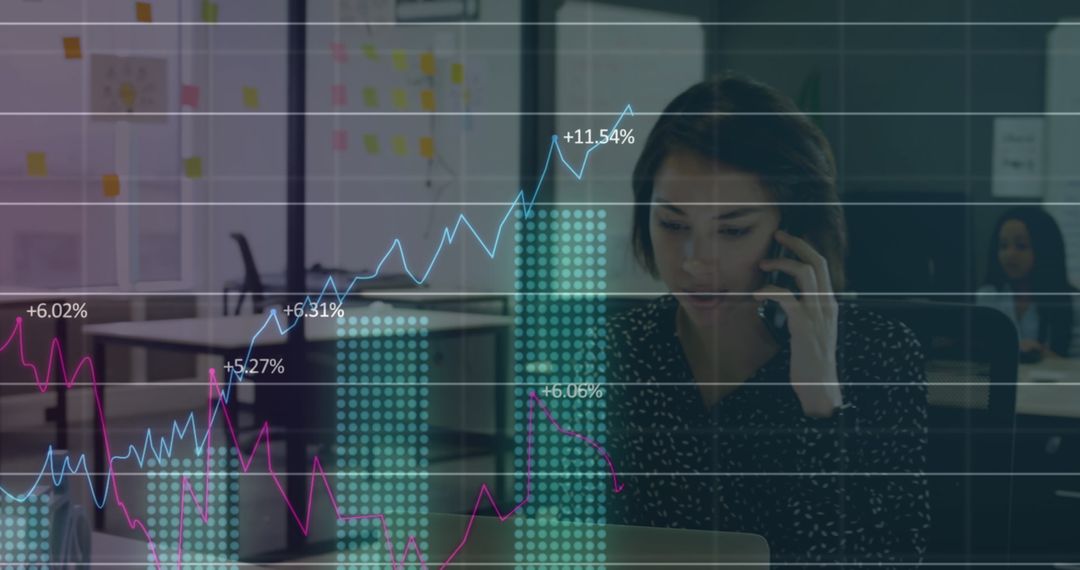 Businesswoman Analyzing Data with Transparent Graph Overlay