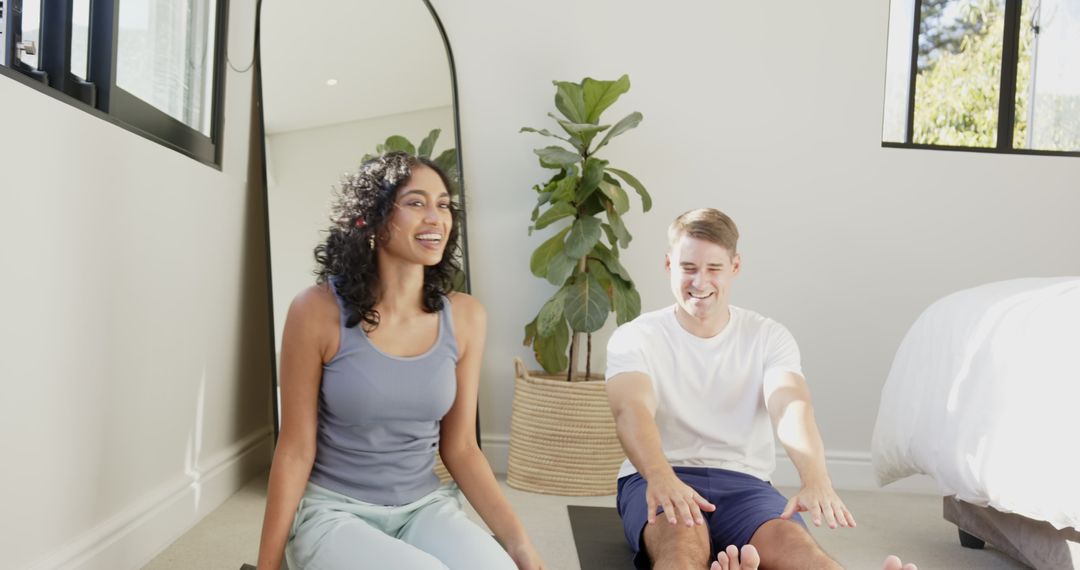 Diverse Couple Engaging in Home Workout for Wellness and Relaxation