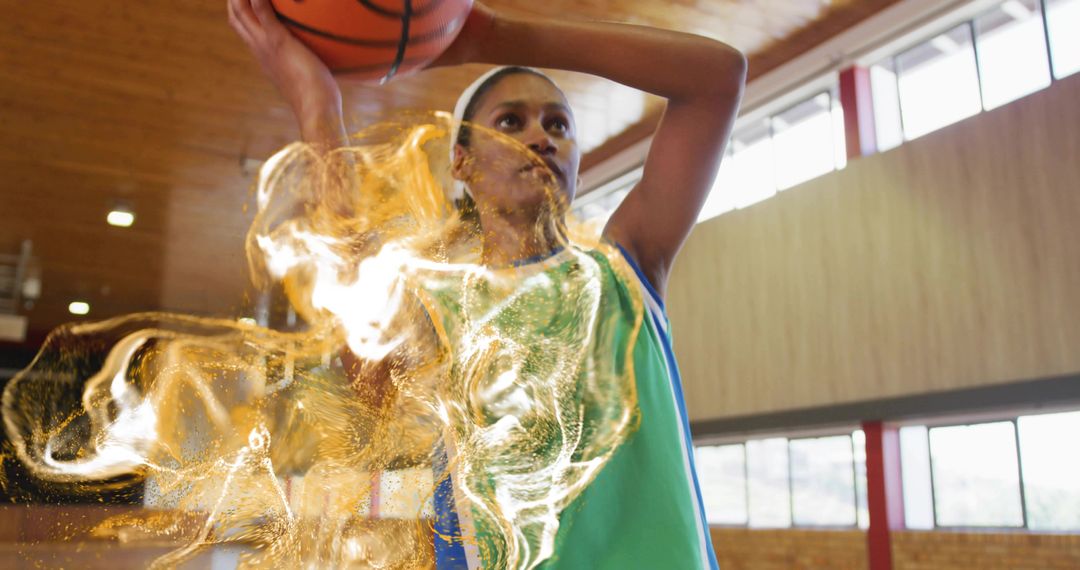 Basketball Player shooting with Fiery Energy Effect in Indoor Arena
