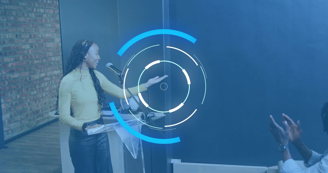 Delivering keynote at lectern holding tablet and microphone with futuristic HUD overlay