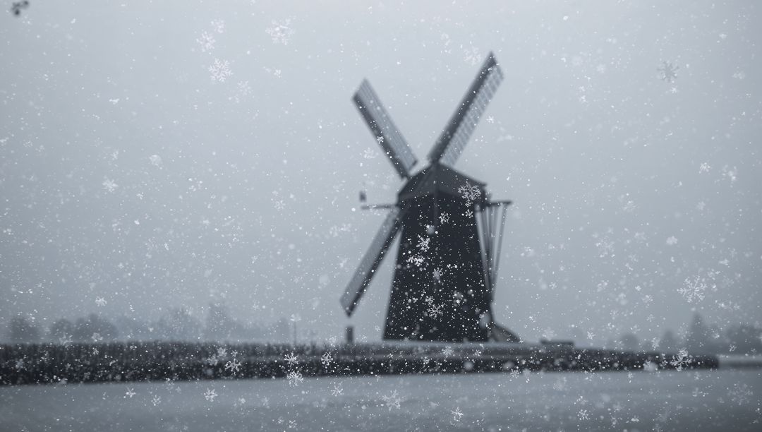 Windmill Silhouetting in Falling Snow Over Canal, Foggy Winter Monochrome Landscape