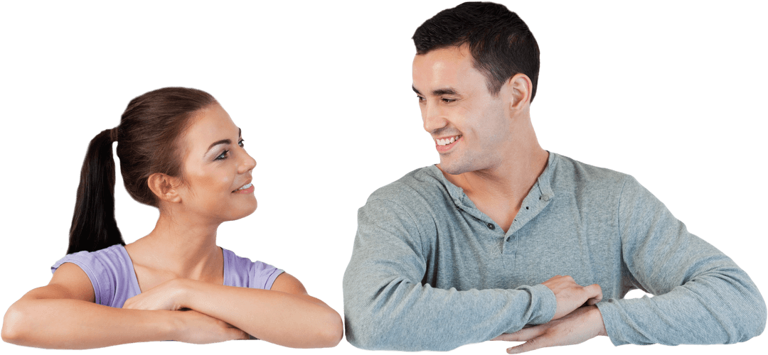 Cheerful Young Couple Holding Transparent Card With Smiling Expressions