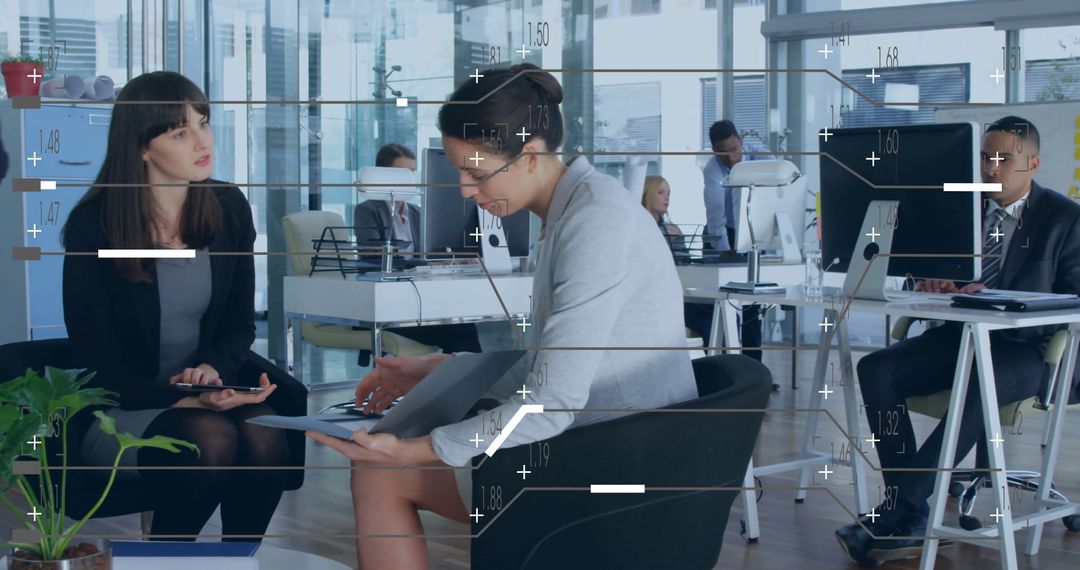 Business Professionals Analyzing Data in Stylish Open Office