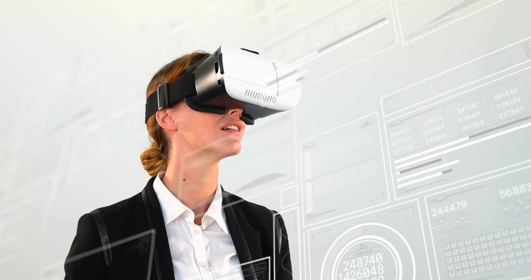 Businesswoman Interacting with Futuristic Virtual Data Interfaces