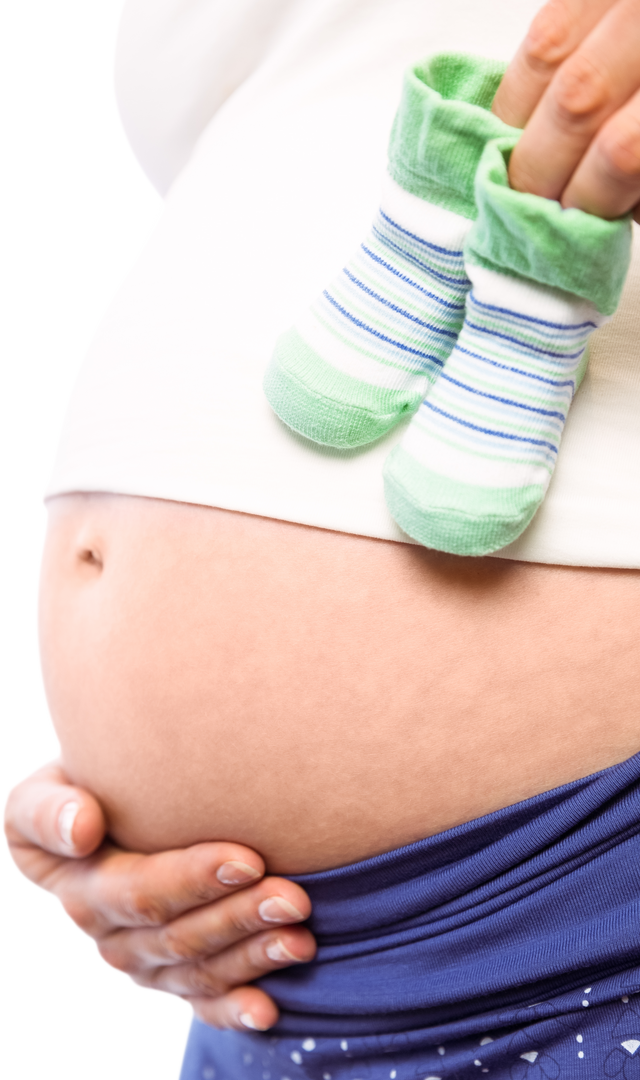 Pregnant Woman Holding Green Baby Shoes Over Bump - Transparent Background - Download Free Stock Images Pikwizard.com