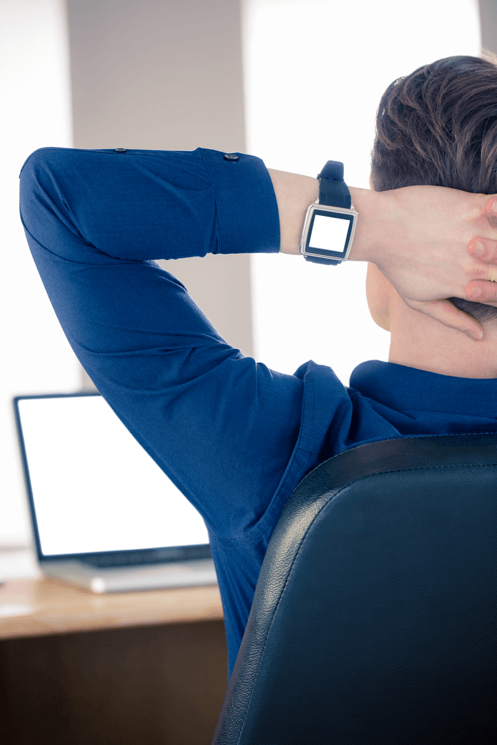Relaxed Businessman with Smartwatch in Transparent Office