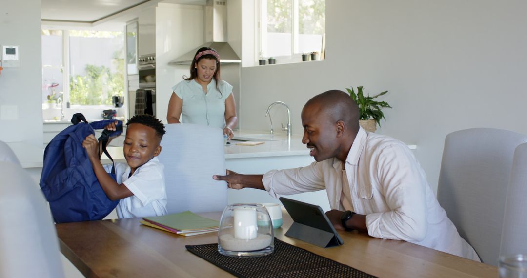 Family Morning Routine with Digital Technology at Breakfast