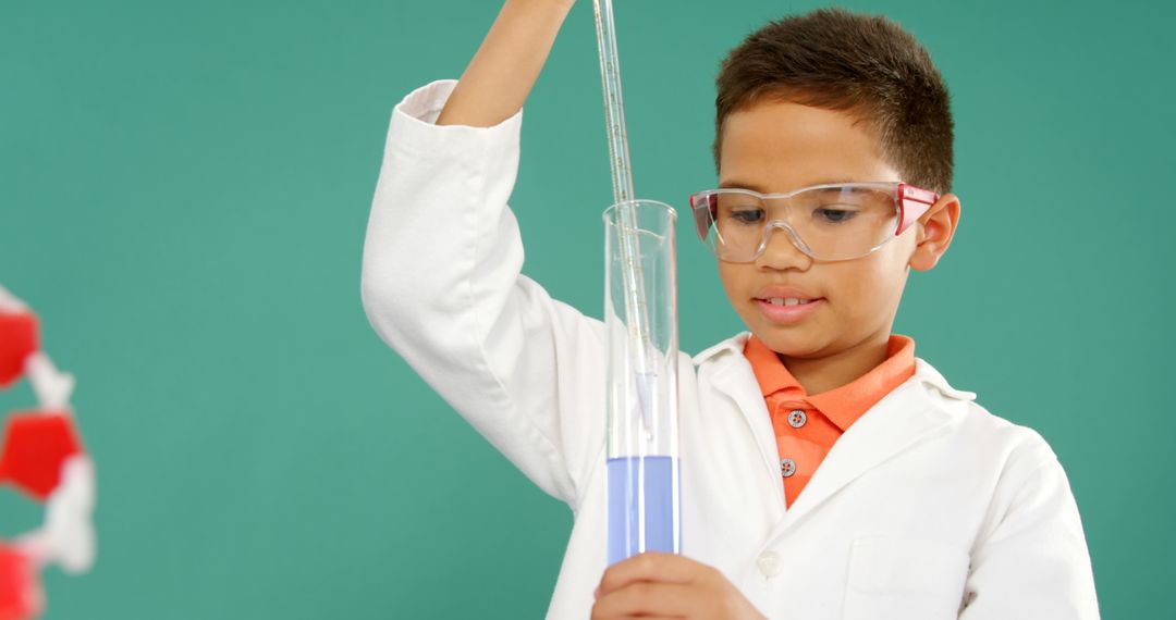 Young Scientist Conducting Chemistry Experiment in Lab Coat - Free Images, Stock Photos and Pictures on Pikwizard.com