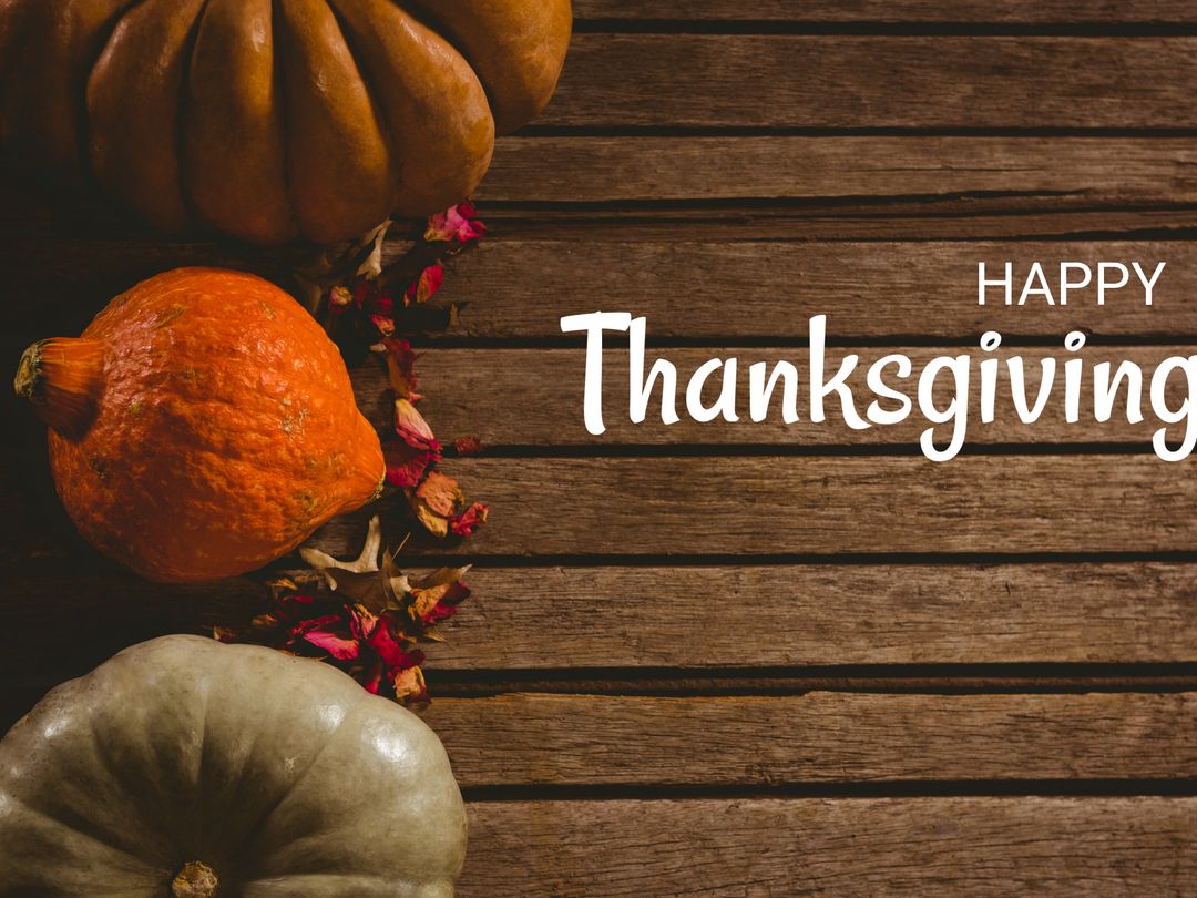Festive Thanksgiving Pumpkins with Rustic Wood Background