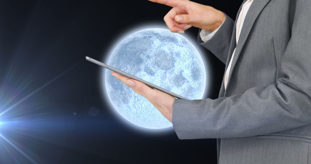 Business Person Using Tablet with Moon in Background - Free Images, Stock Photos and Pictures on Pikwizard.com