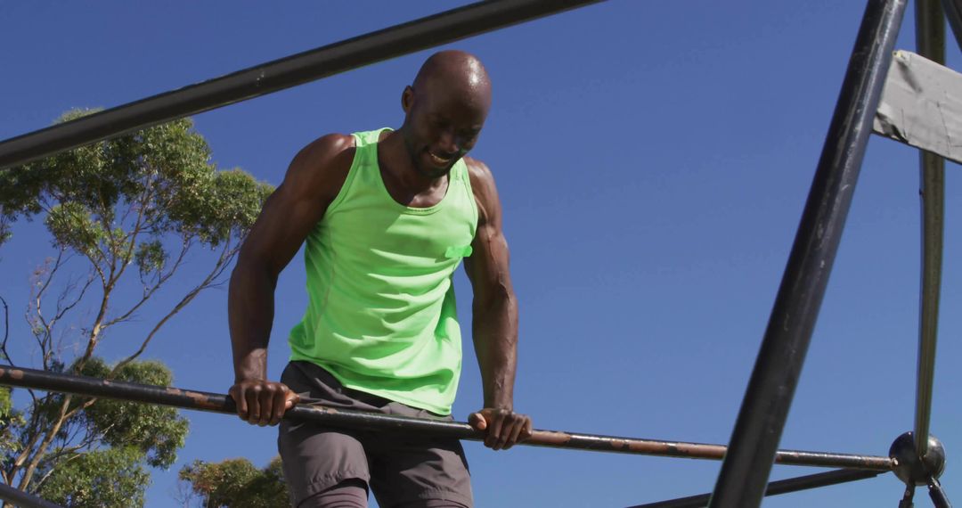 Man Performing Exercise on Outdoor Fitness Bars