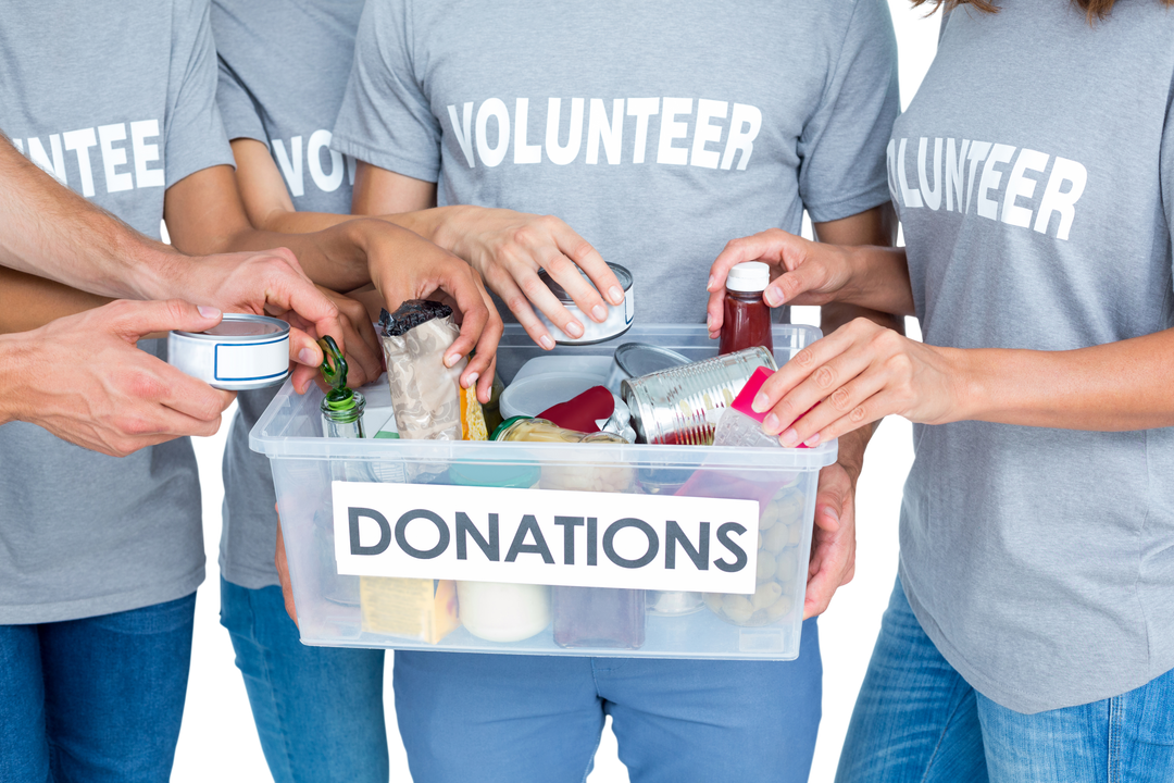 Volunteers Organizing Donation Box with Charitable Contributions - Download Free Stock Images Pikwizard.com