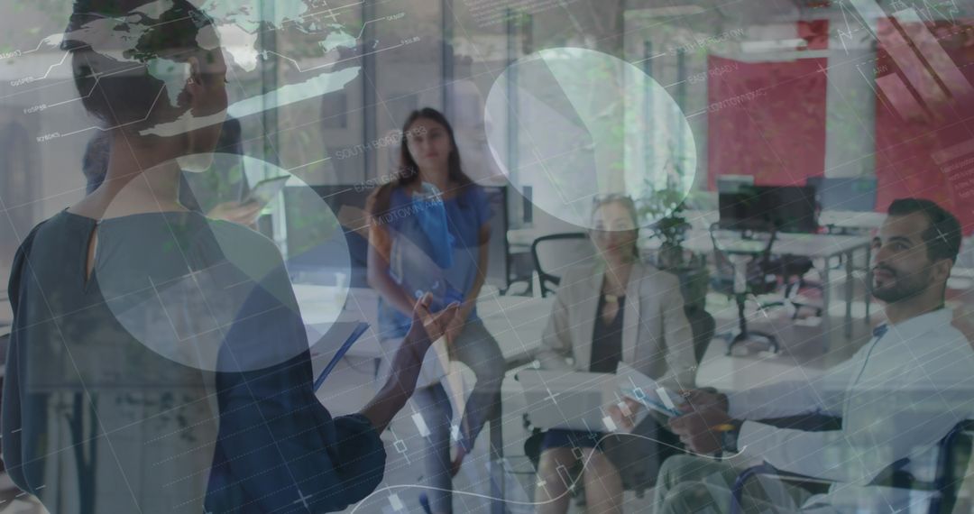 Team Collaborating with Holographic Data Display