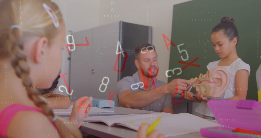 Teacher Explains Ear Anatomy to Attentive Students in Classroom