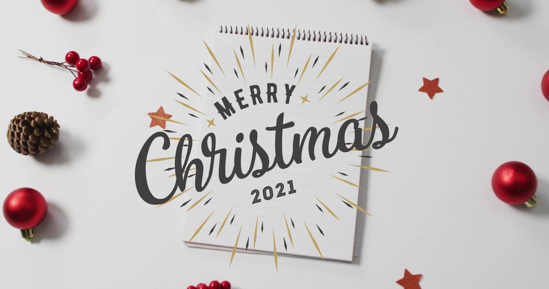 Merry Christmas 2021 Notepad Flatlay Featuring Red Baubles Pinecone Minimal Holiday Layout