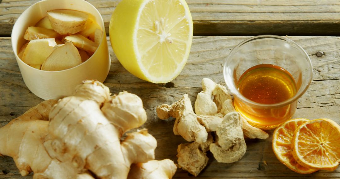 Natural Home Remedies with Fresh Ginger, Lemon, and Honey on Wooden Table - Free Images, Stock Photos and Pictures on Pikwizard.com