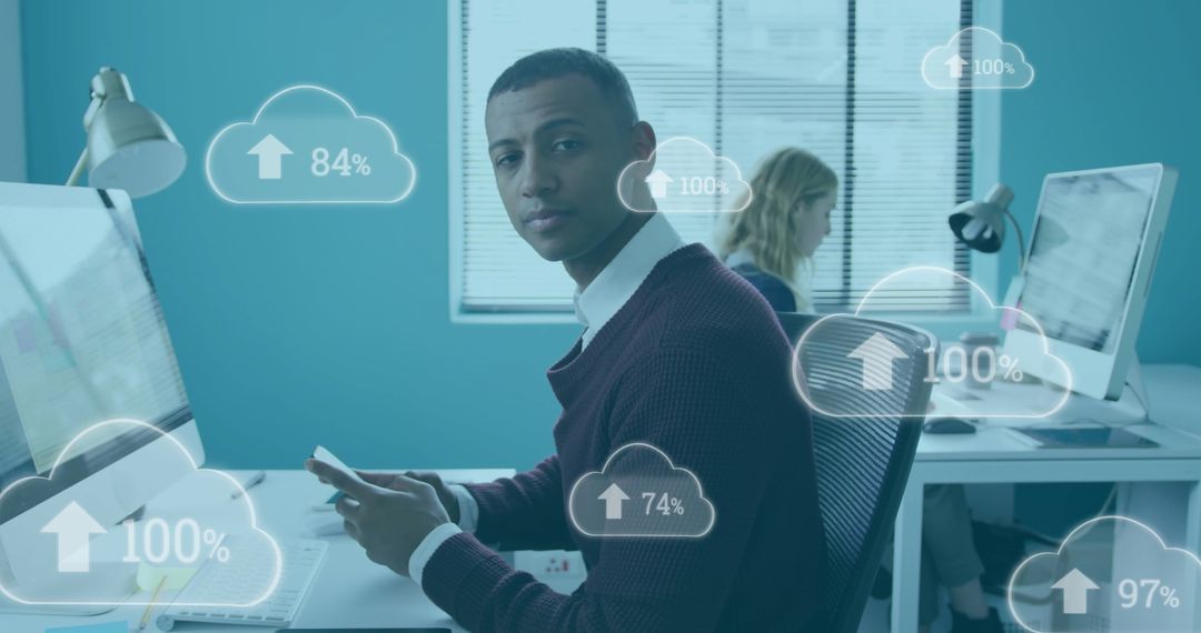 Young Professional Engaged with Digital Cloud Interface in Modern Office