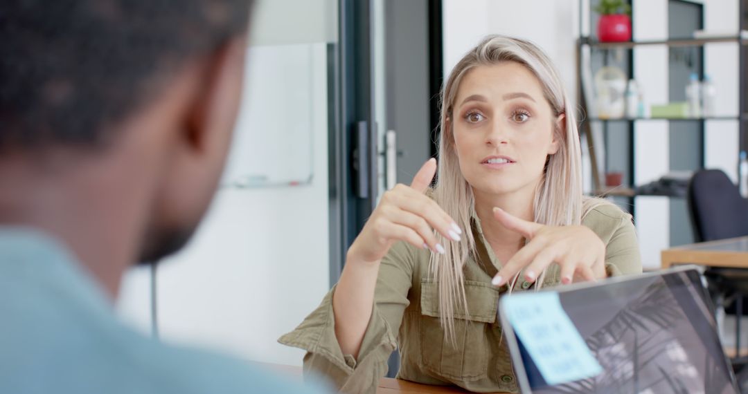 Diverse Office Team Discussing Work Strategy Together