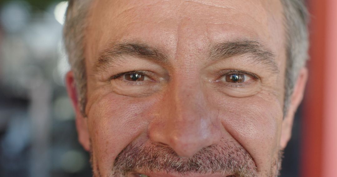 Intimate Closeup Portrait Mature Man with Stubble Showing Skin Texture and Catchlights