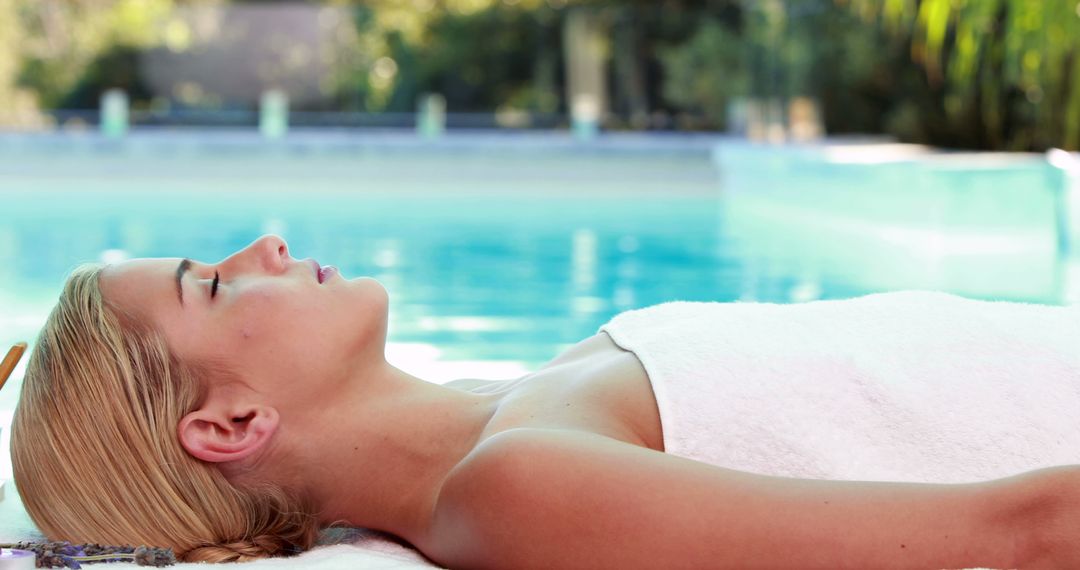 Young Woman Relaxing by Swimming Pool in Spa - Free Images, Stock Photos and Pictures on Pikwizard.com