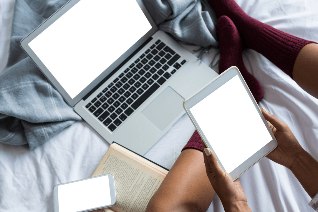 Woman Connected Through Gadgets on Transparent White Bed