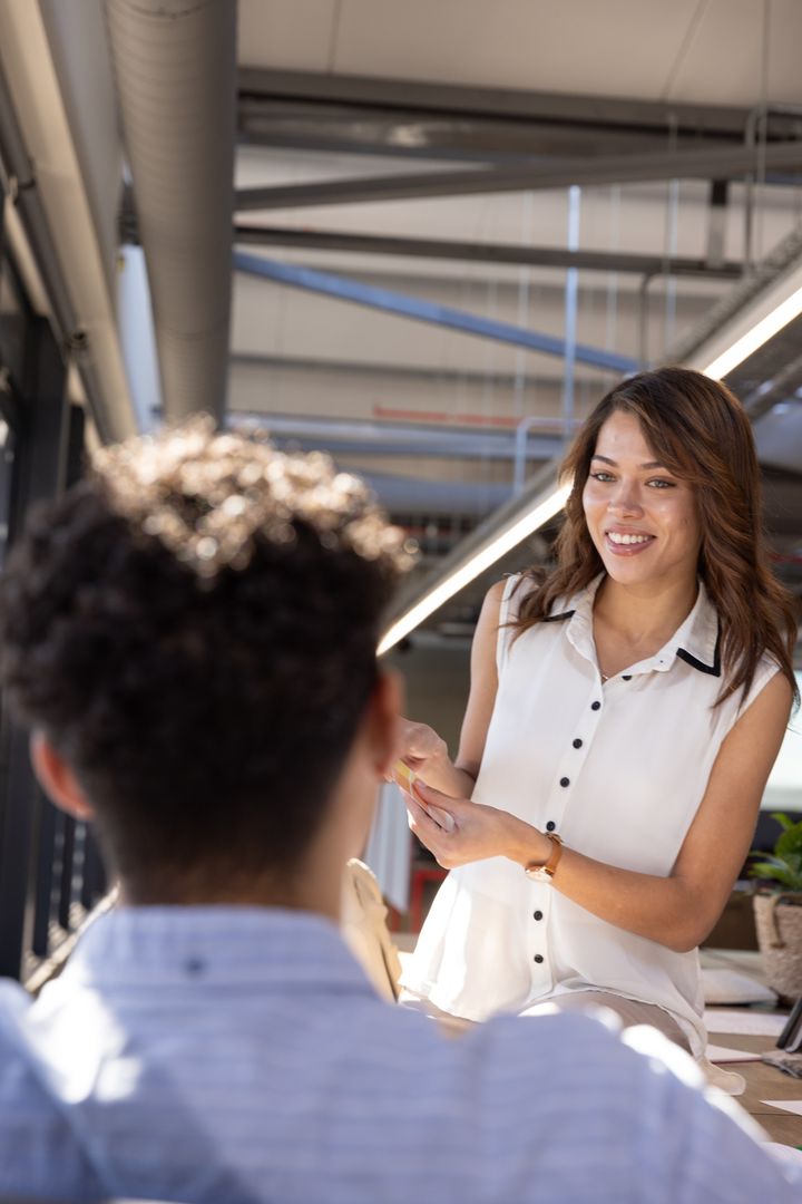 Diverse Coworkers Doing Office Work in Modern Workspace Environment