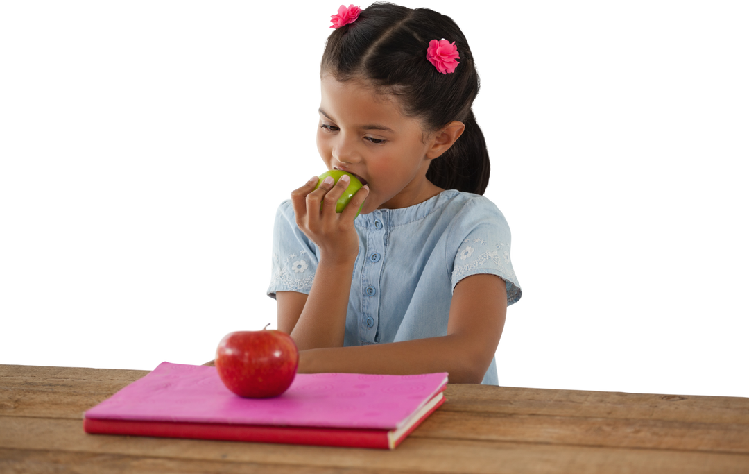 Girl with Pigtails Eating a Granny Smith Apple at Transparent Table - Download Free Stock Images Pikwizard.com