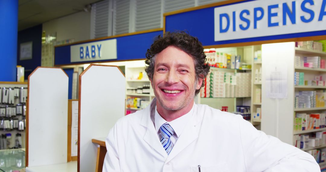 Portrait of happy pharmacist standing at counter in pharmacy 4k - Free Images, Stock Photos and Pictures on Pikwizard.com