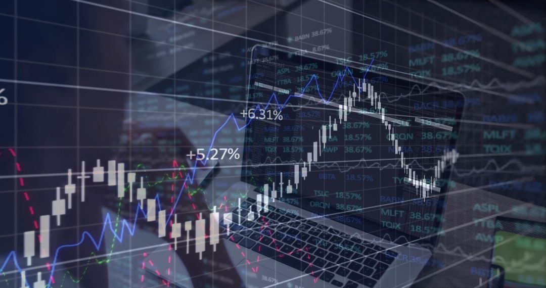 Laptop Displaying Trading Charts and Data Analysis in Modern Workspace