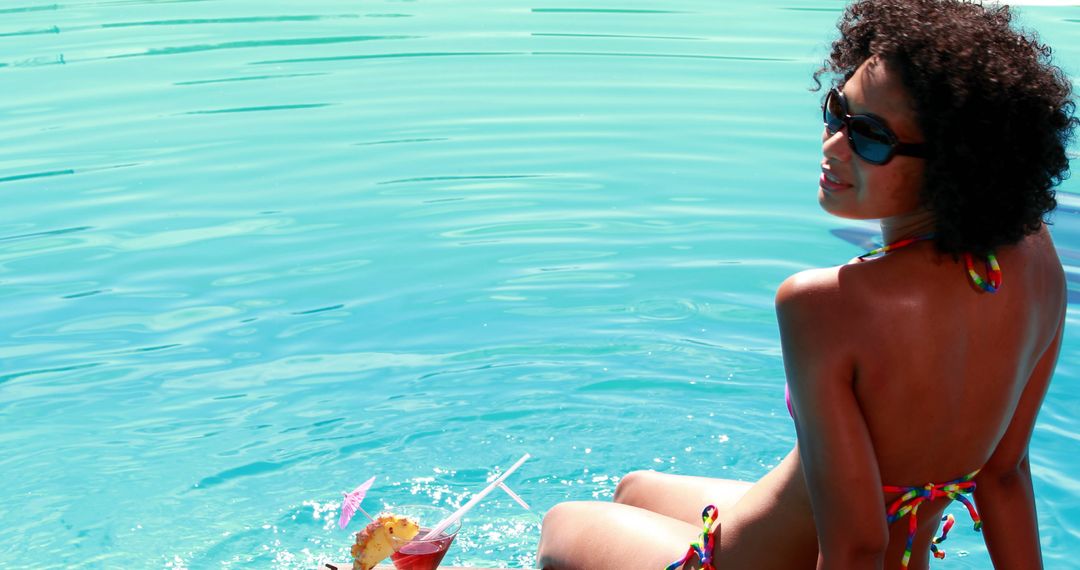 Woman Relaxing by Poolside with Cocktail - Free Images, Stock Photos and Pictures on Pikwizard.com