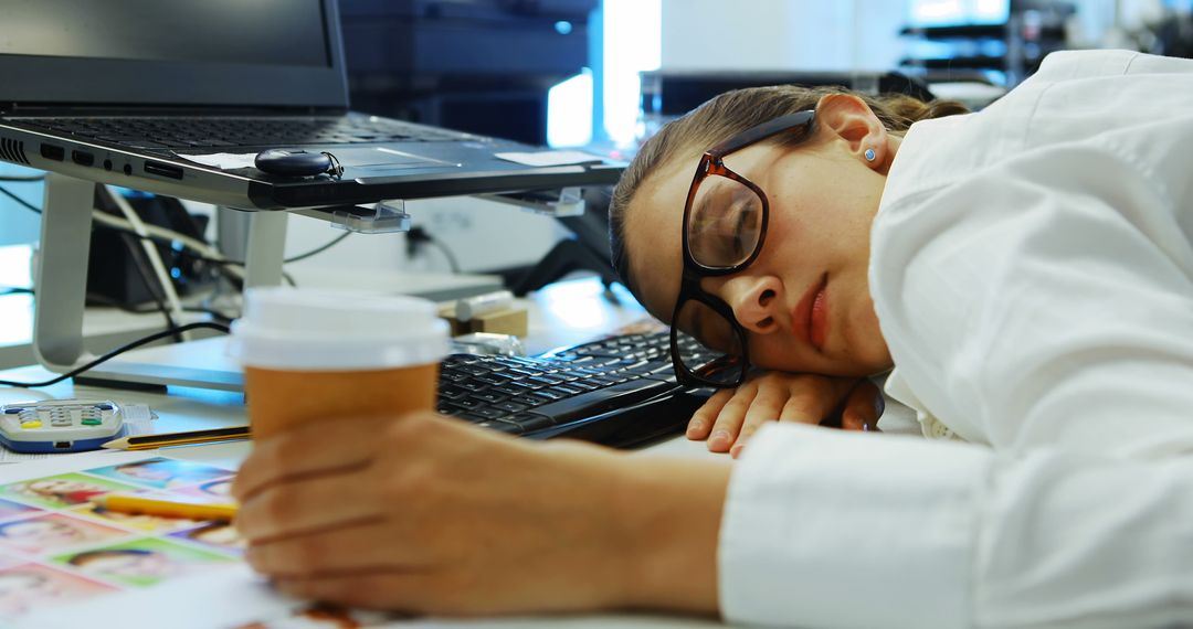 Exhausted Woman Sleeping at Desk During Work - Free Images, Stock Photos and Pictures on Pikwizard.com