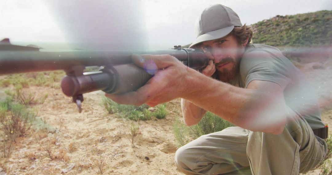 Sharpshooter Man Aiming Rifle in Desert Wilderness