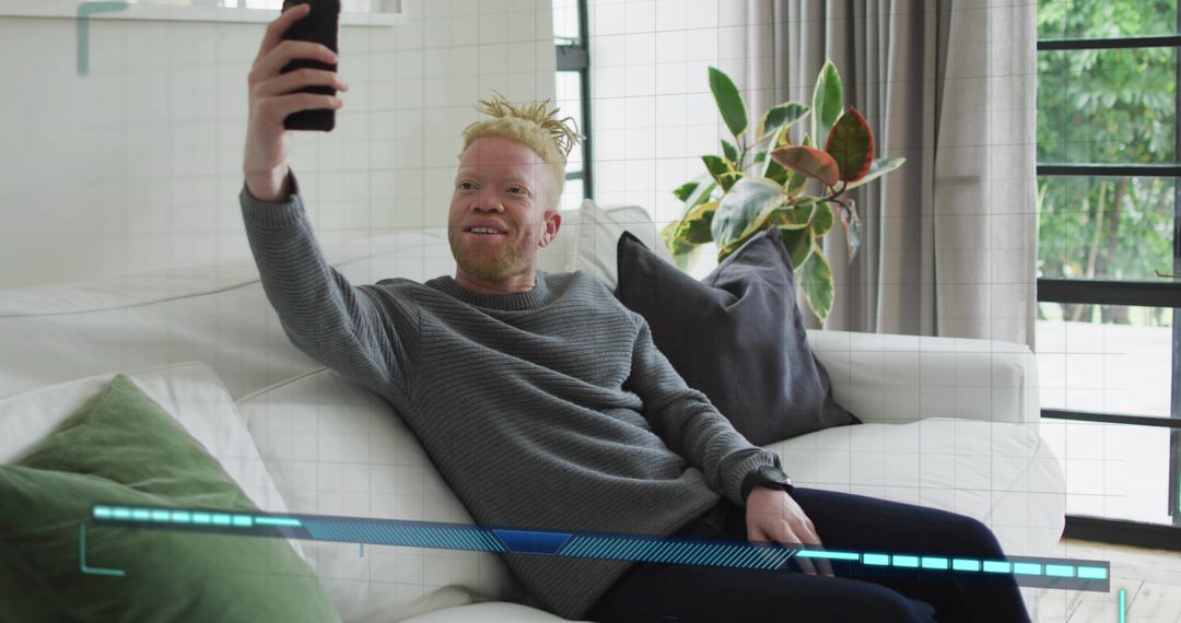 Man Taking Selfie with Digital Interface Overlay in Modern Living Room